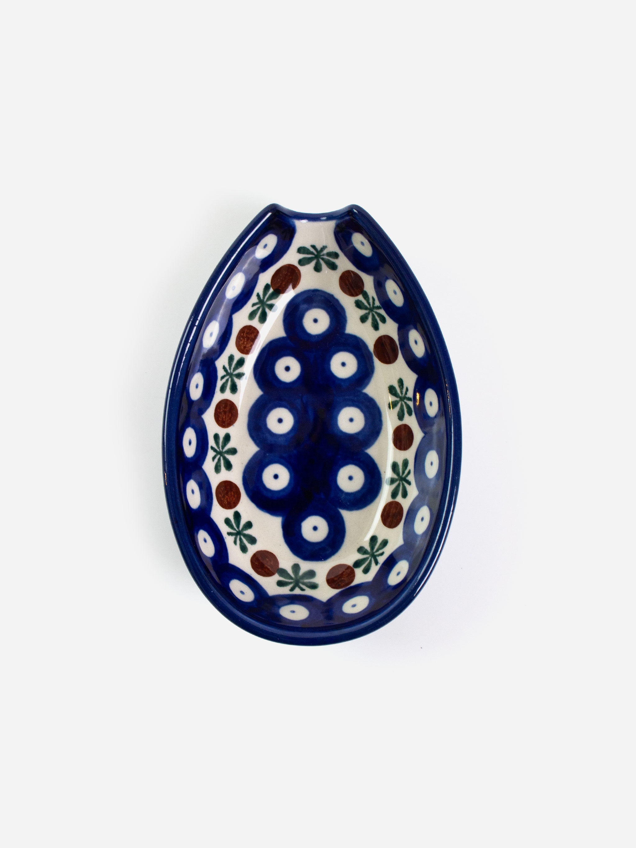 Polishware ceramic spoon rest featuring colorful handpainted patterns