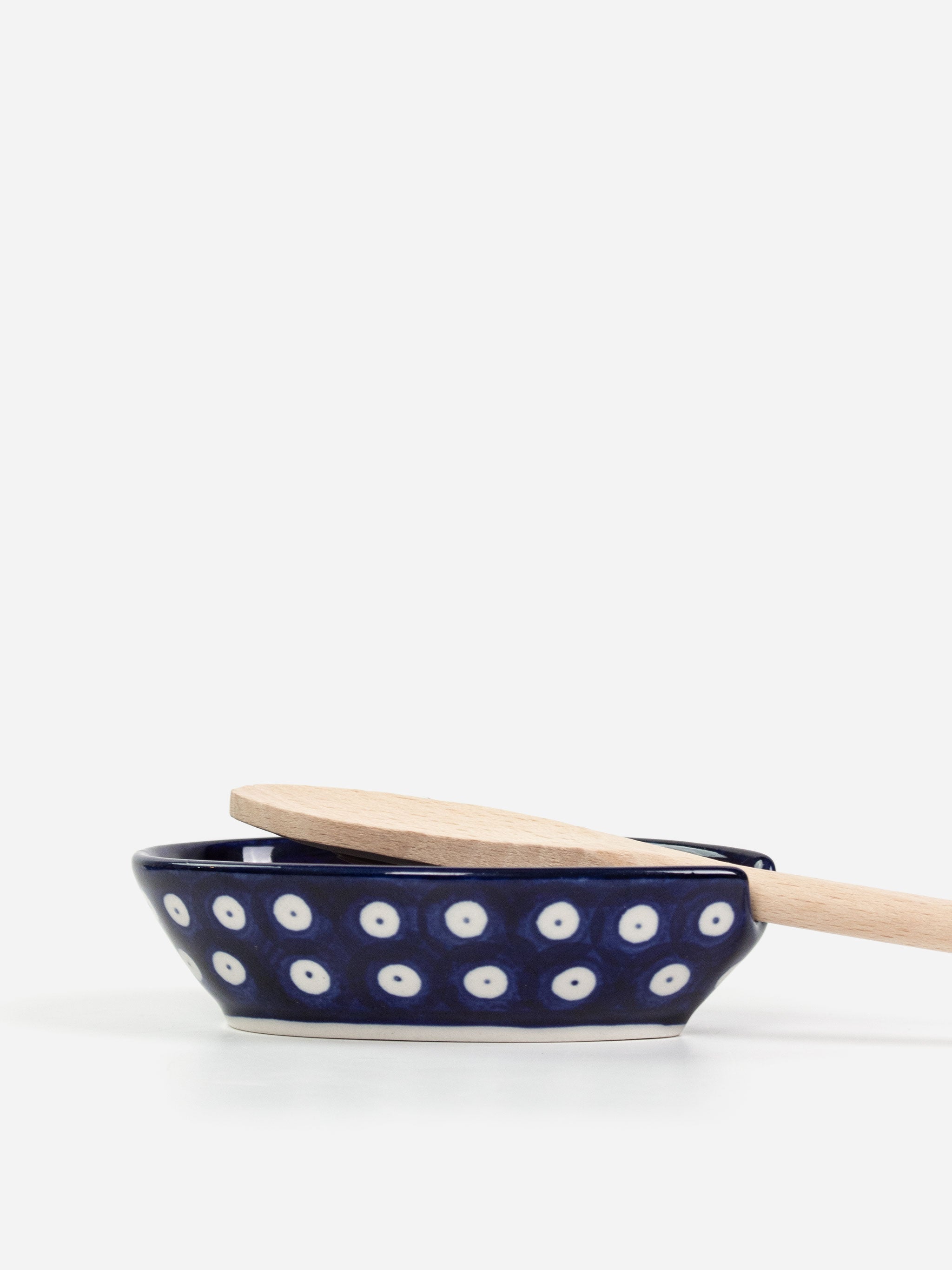 Polishware ceramic spoon rest featuring colorful handpainted patterns