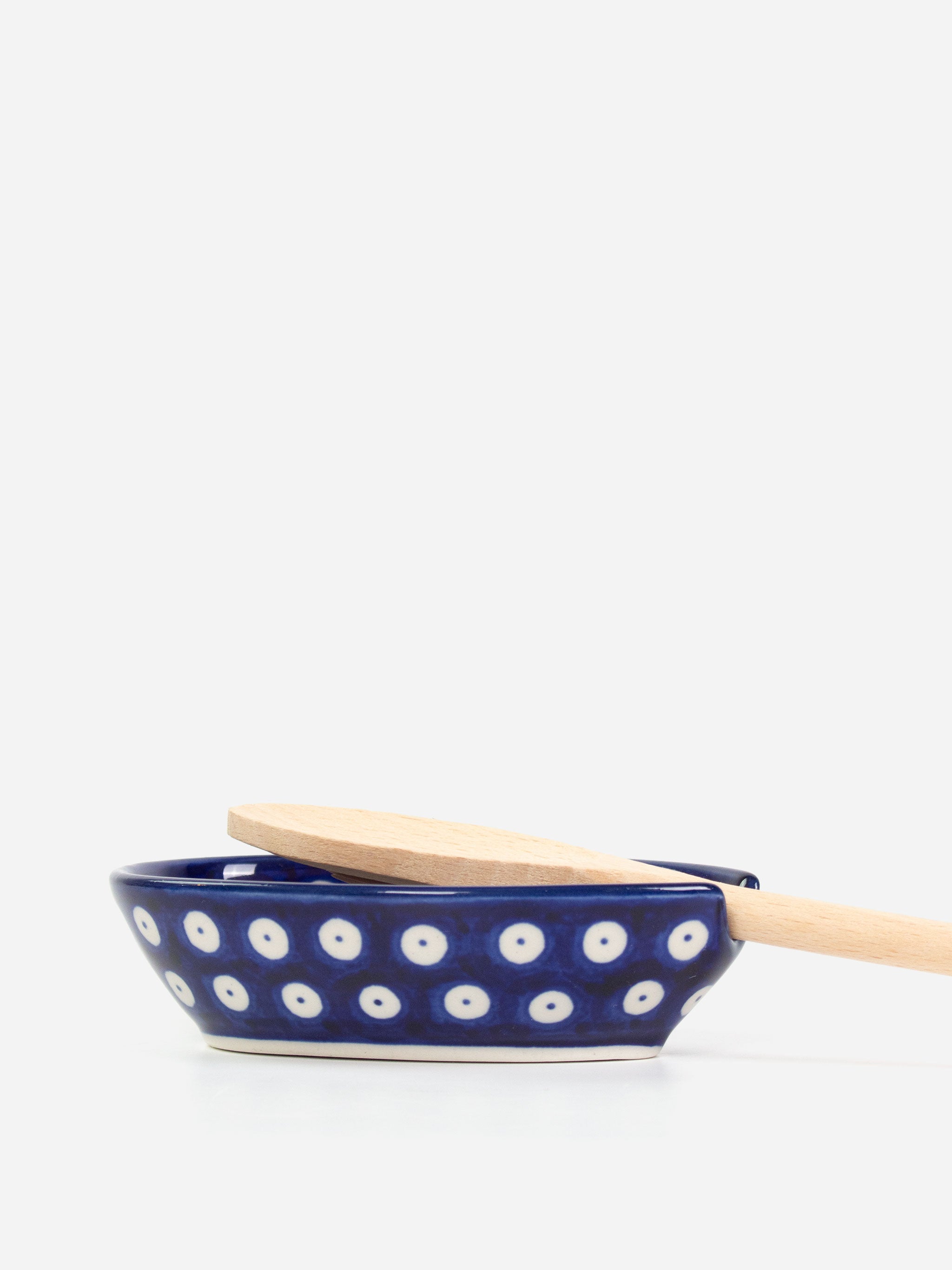 Polishware ceramic spoon rest featuring colorful handpainted patterns